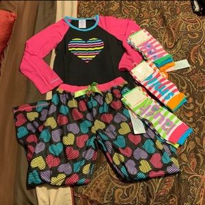 New bundle of pajamas set And 3packs (6) of socks.